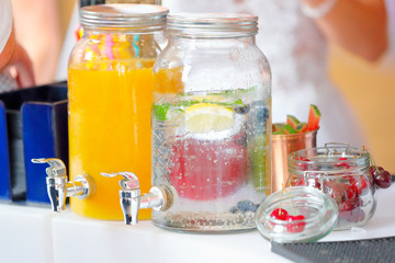 Expert barman making cocktail at event or wedding reception
