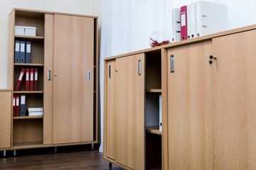 cabinets with folders in modern office