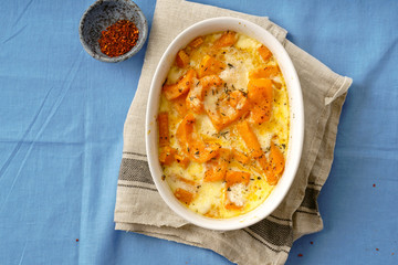 Roasted squash baked with heavy cream, thyme, white wine and parmesan cheese