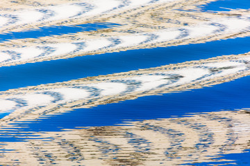 Reflection of a building on the surface of water