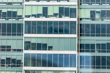 Windows on a multi-storey building as a background