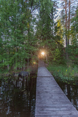 View of the wooden pier of the lake in Karelia