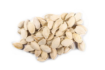 pile pumpkin seeds isolated on white background, top view