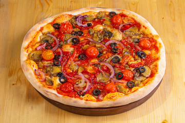 Pizza with mushrooms and tomatoes