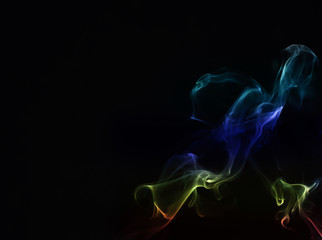 Color smoke on black background.