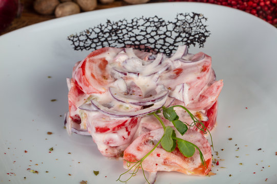 Delicious tomatoes with onios