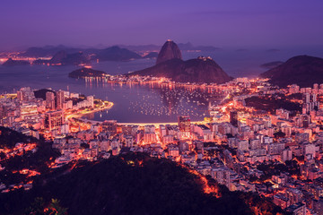 Rio de Janeiro skyline panorama at sunsey, Brazil. Sugarloaf Mountain and Botafogo Bay - obrazy, fototapety, plakaty
