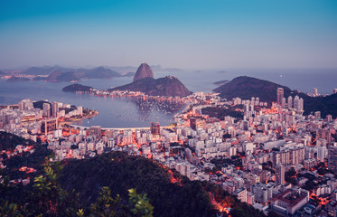 Sugarloaf Mountain at sunset with skyline of Rio de Janeiro, Brazil
