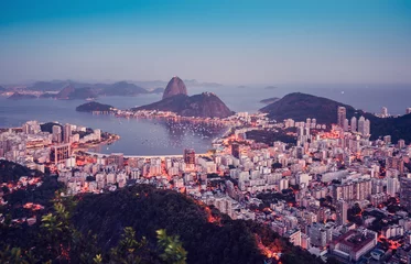 Poster Sugarloaf Mountain at sunset with skyline of Rio de Janeiro, Brazil © marchello74