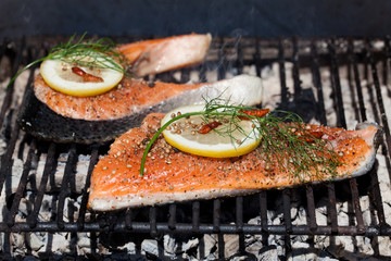 grilled salmon filet on barbecue - healthy food