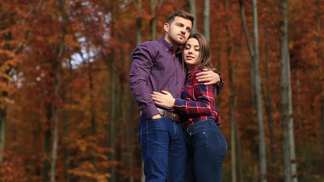 Man hugs hus belowed woman