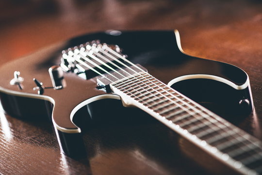close up of black electric guirar