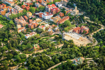Naklejka premium Aerial view of famous Park Guell located on Carmel Hill in Barcelona, Spain