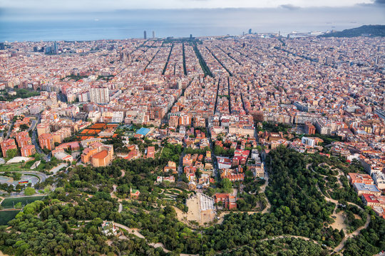 Aerial high angle view of famous Park Guell and city skyline panorama, Barcelona, Spain