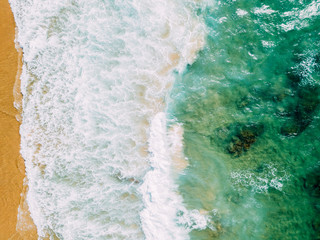 Aerial Panoramic Drone View Of Blue Ocean Waves Crushing On Sandy Beach in Portugal