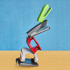 Equilibrated construction of staplers and hole punchers in zero gravity.