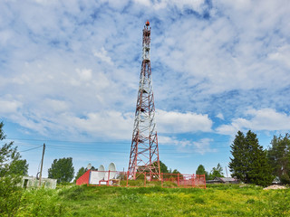 Fototapeta na wymiar cell tower in the village