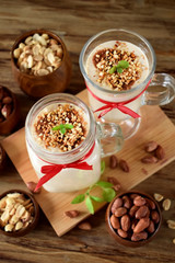 Protein cocktail with peanuts in a glass jar