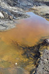 Oil and tar pollution of industrial terrain and soil