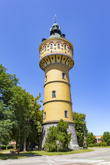 The Wilhelminian water tower, 1906, height 50 m, on the left a blooming horse chestnut