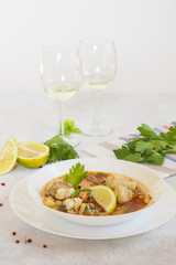 Fish soup from cod fish and salmon with white wine.