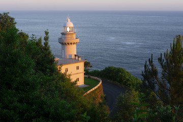 Fototapeta na wymiar The Igueldo Lighthouse in San Sebastian city, Basque Country, Spain. Photographed at sunrise.