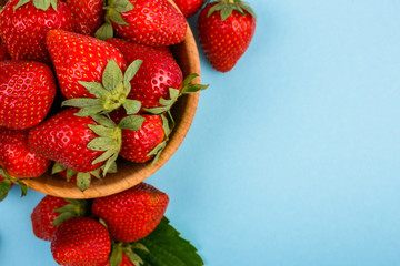 juicy fresh strawberry on a delicately blue background