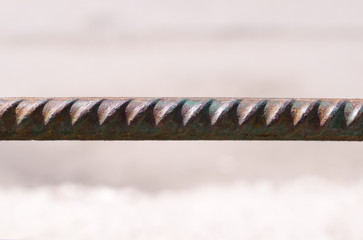 long rusty steel rod, armature. industrial.