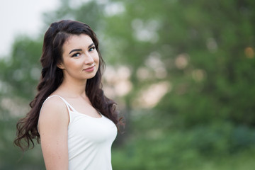 Naklejka premium Young woman in the nature