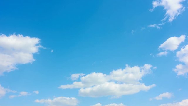 Blue sky with white heap clouds - 4K timelapse
