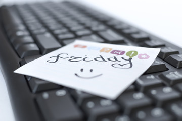 days of the week written marker on the sticker are on the keyboard