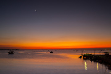Beautiful sunset landscape view on sea and boat with colorful of sky located eastern of in Thailand