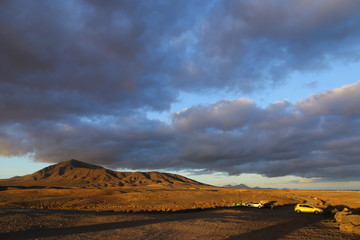 Fototapeta na wymiar cloudy desert mountains