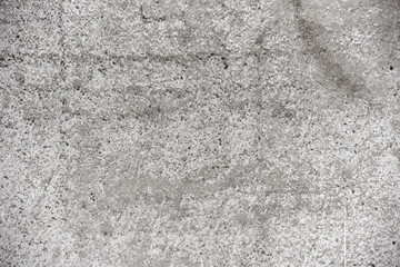 Old gray wall background of natural cement or stone