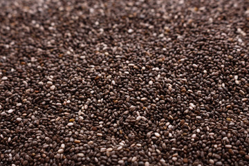 chia seeds on a white acrylic background