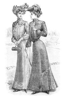 two women wearing vintage dresses
