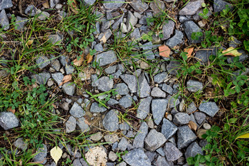 Grey stones on a soil. Nature background 