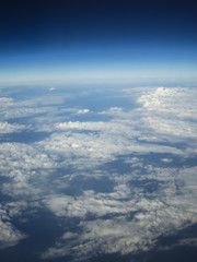 Obraz na płótnie Canvas Bird eye view of cloudy on sky from airplane
