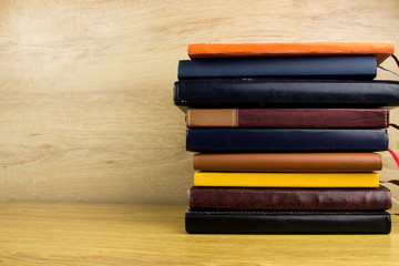 Different color books tower. Simply School and education concept. Empty space for your text and design