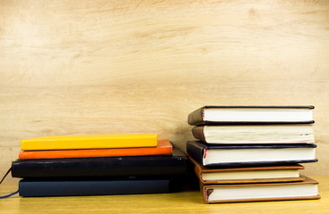 Different color books tower. Simply School and education concept. Empty space for your text and design