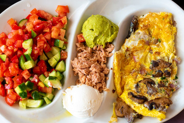 A delicious tradition Mediterranean breakfast in the port of Tel-Aviv, Israel. Selective focus.