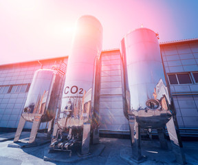 The tank with water, carbon and ladder. Equipment for beverages factory.