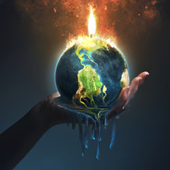 Melting earth in palm of hand