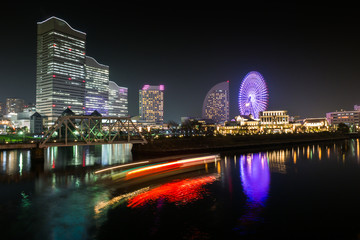 Water reflection of wonderful color at night time ,cityscape view at Yokohama japan