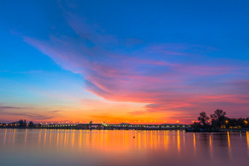 Fototapeta premium scenery sunrise above Sarasin bridge. fishing boats parking on the Sarasin beach. Sarasin bridge linking the province of Phang Nga and Phuket.
