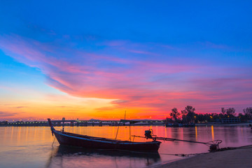 scenery sunrise above Sarasin bridge. fishing boats parking on the Sarasin beach. Sarasin bridge linking the province of Phang Nga and Phuket.