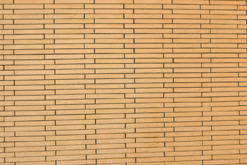 close up of cement wall brick yellow color of texture 