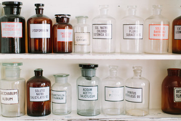 Bottles on the shelf in old pharmacy