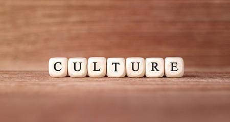 Word CULTURE made with wood building blocks