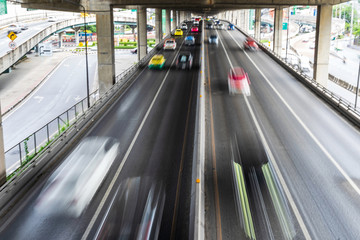 Motion blur of car on the road in the city